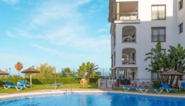 Apartment in Manilva with Pool and Parking