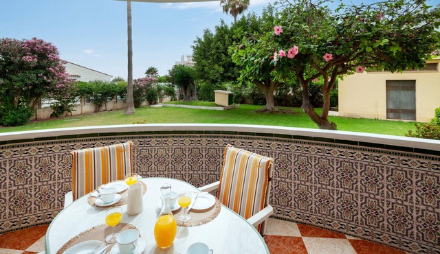 Apartment 'Los Rubios Playa' with Private Terrace, Shared Garden and Wi-Fi