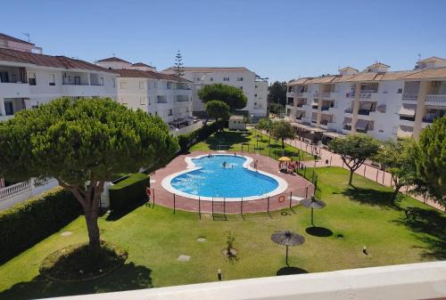Bonito piso con piscina y pádel
