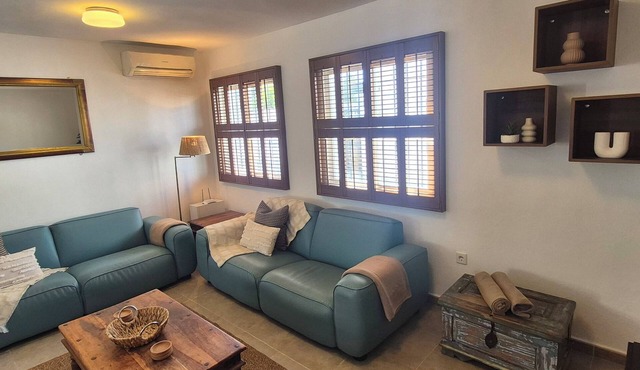 Charming Villa offers the perfect blend of comfort, style, and rustic charm.