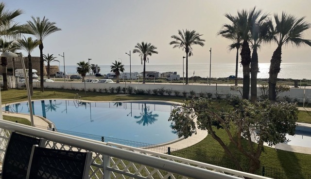 Holiday Apartment "Primera Linea Marina Del Faro" with Sea View, Shared Pool & Wi-Fi