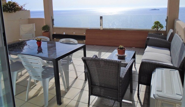 Holiday Home 'Atico Torre del Rayo' with Sea View, Shared Pool & Wi-Fi