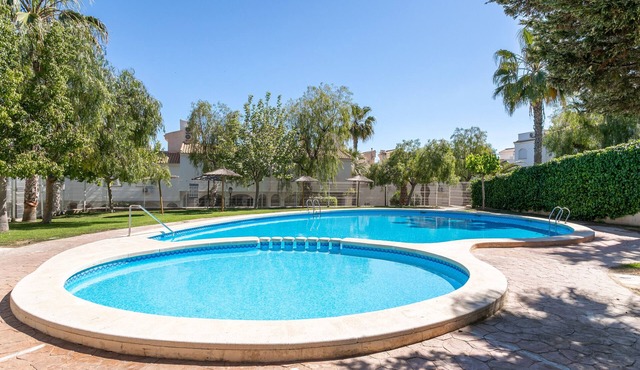 Holiday Home 'Casa en la Playa con Piscinas V' with Shared Pool and Air Conditioning