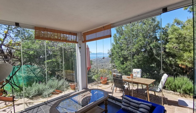 House overlooking the sea and Malaga