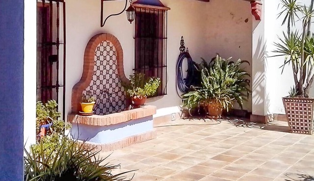 In the province of Seville, well decorated Andalusian villa with large terrace overlooking the mountains &