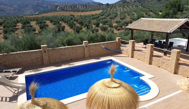 Luxurious villa nestled amongst olive groves with stunning mountain views.