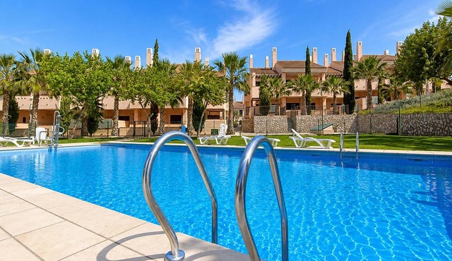 Luxury apartment with pool views from a large terrace on world class golf resort