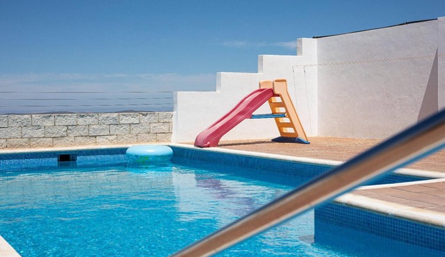 Nice home in Baena with outdoor swimming pool