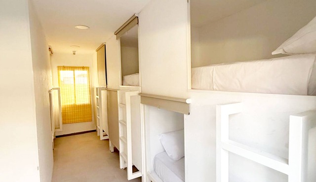 Single capsule in room of 16 capsules