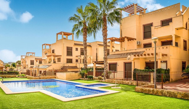 Spacious and practical vacation apartment in a gated community with communal pools.