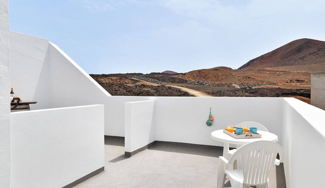 Vacation Home "Viviendas El Pescador - Timón" with Sea View, Private Terrace & Wi-Fi