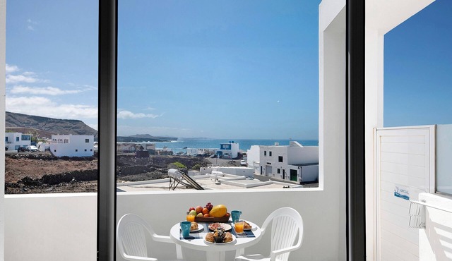 Vacation Home 'Viviendas El Pescador - Vela' with Shared Terrace and Wi-Fi