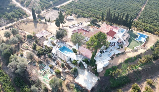 Vies and cool summer breeze over the plot and pool.