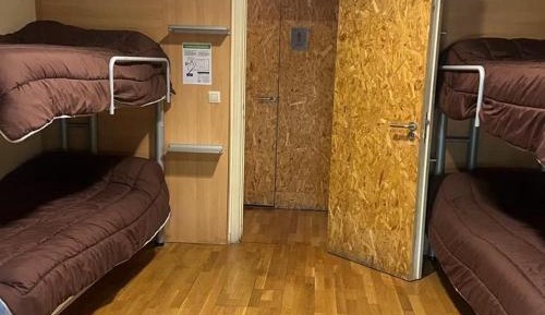 Single Bed in Dormitory Room