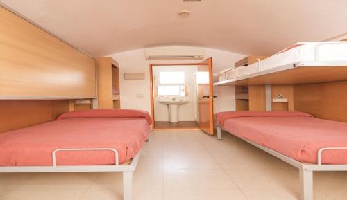 Bed in Dormitory